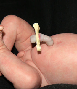 Baby doll store with umbilical cord