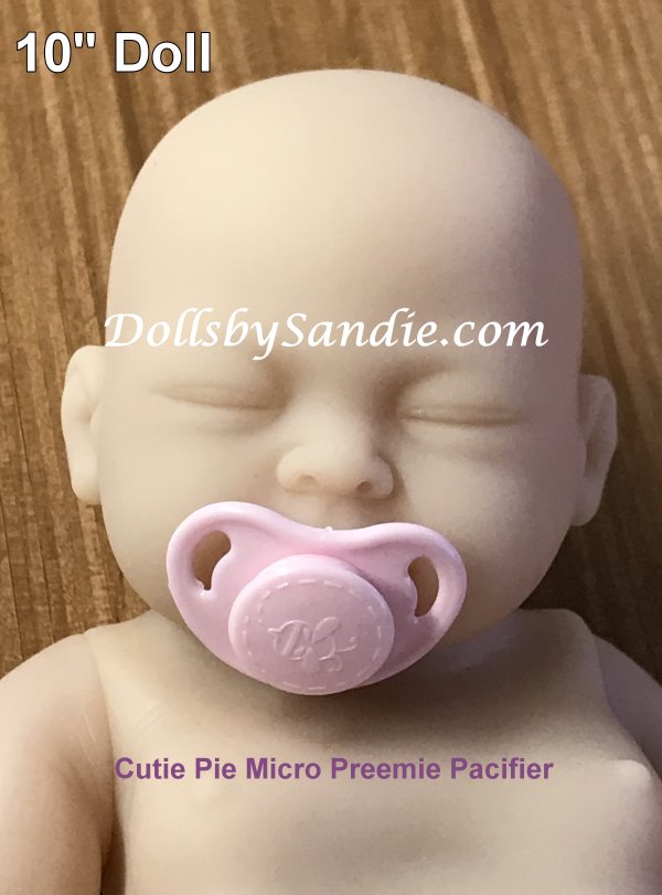 bottle,diapers,doll, preemie,monkey Must see reborn Baby pacifier 10 pockets 